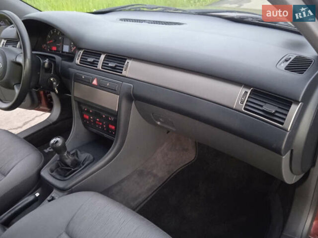 Красный Ауди А6, объемом двигателя 1.8 л и пробегом 199 тыс. км за 5800 $, фото 7 на Automoto.ua