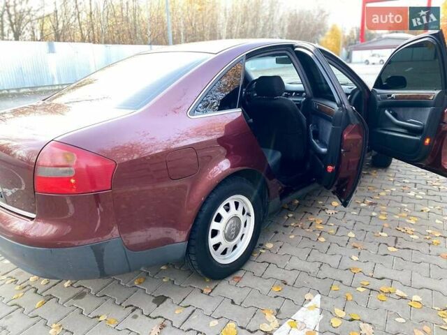 Красный Ауди А6, объемом двигателя 2.4 л и пробегом 280 тыс. км за 5200 $, фото 5 на Automoto.ua