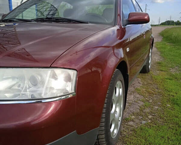 Красный Ауди А6, объемом двигателя 1.8 л и пробегом 199 тыс. км за 5800 $, фото 9 на Automoto.ua