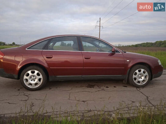 Красный Ауди А6, объемом двигателя 1.8 л и пробегом 199 тыс. км за 5800 $, фото 1 на Automoto.ua