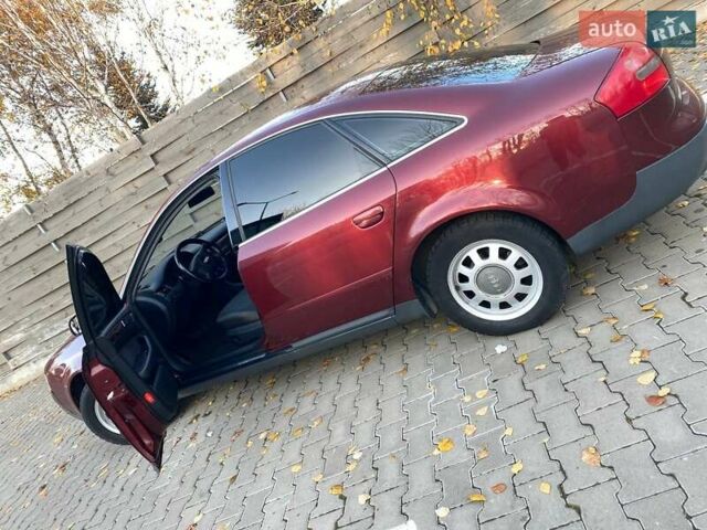 Красный Ауди А6, объемом двигателя 2.4 л и пробегом 280 тыс. км за 5200 $, фото 21 на Automoto.ua