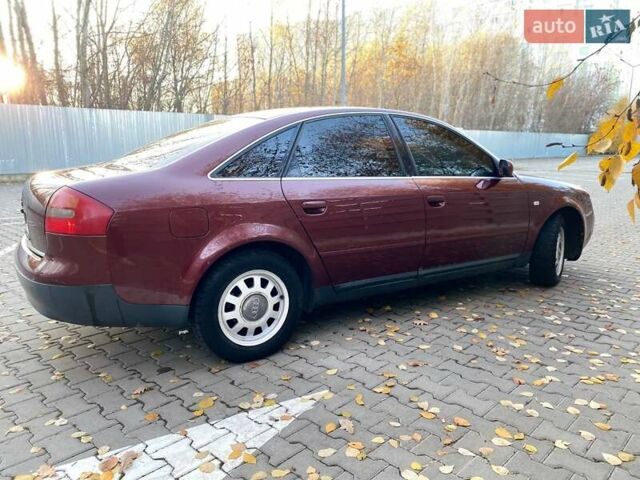 Красный Ауди А6, объемом двигателя 2.4 л и пробегом 280 тыс. км за 5200 $, фото 2 на Automoto.ua