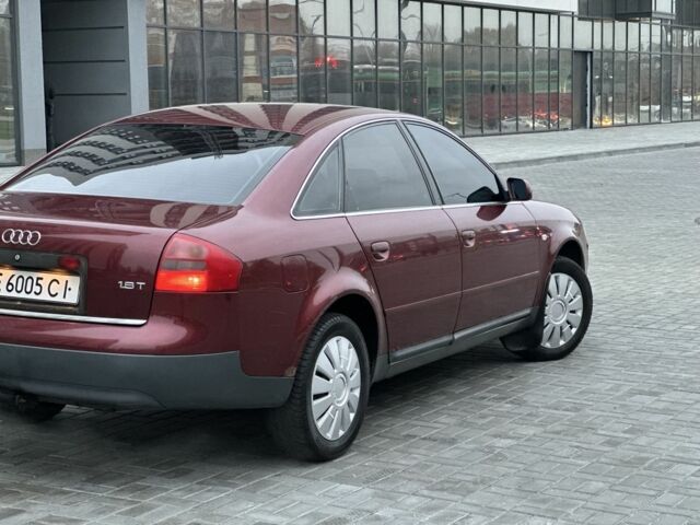 Красный Ауди А6, объемом двигателя 1.8 л и пробегом 50 тыс. км за 3300 $, фото 1 на Automoto.ua