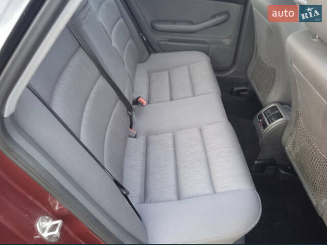 Красный Ауди А6, объемом двигателя 1.8 л и пробегом 199 тыс. км за 5800 $, фото 6 на Automoto.ua