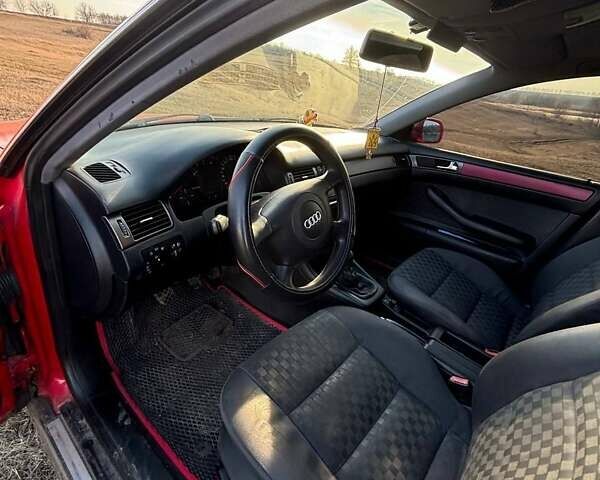 Красный Ауди А6, объемом двигателя 1.8 л и пробегом 198 тыс. км за 3900 $, фото 22 на Automoto.ua