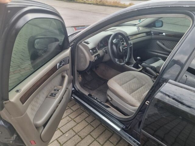 Червоний Ауді А6, об'ємом двигуна 2 л та пробігом 301 тис. км за 1598 $, фото 5 на Automoto.ua