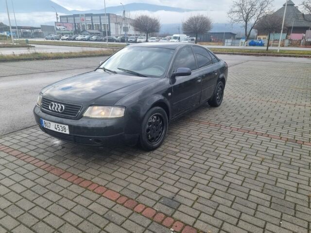 Червоний Ауді А6, об'ємом двигуна 2 л та пробігом 301 тис. км за 1598 $, фото 1 на Automoto.ua