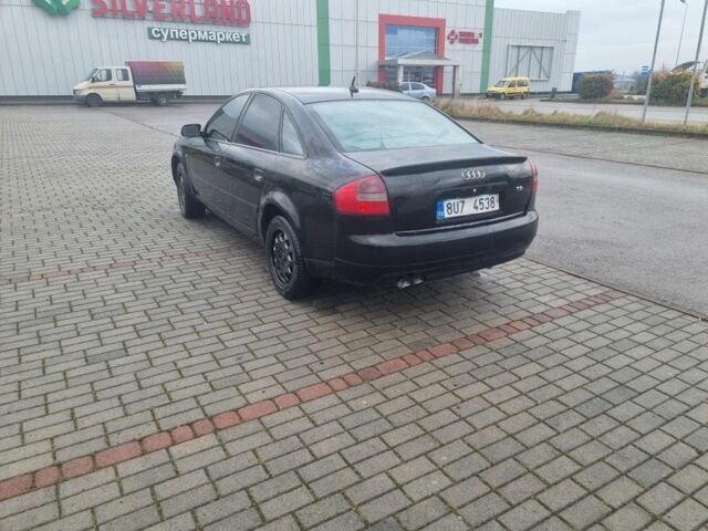 Червоний Ауді А6, об'ємом двигуна 2 л та пробігом 301 тис. км за 1598 $, фото 4 на Automoto.ua