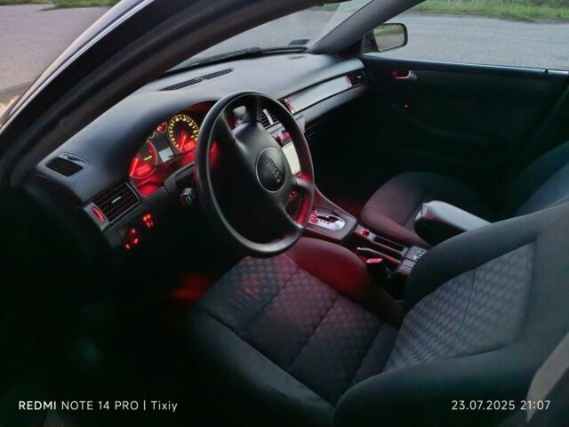 Красный Ауди А6, объемом двигателя 2.5 л и пробегом 300 тыс. км за 2600 $, фото 7 на Automoto.ua