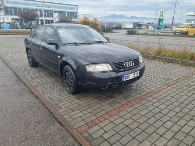 Червоний Ауді А6, об'ємом двигуна 2 л та пробігом 301 тис. км за 1598 $, фото 2 на Automoto.ua