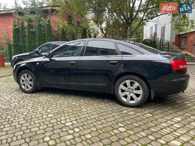 Червоний Ауді А6, об'ємом двигуна 2 л та пробігом 248 тис. км за 8850 $, фото 1 на Automoto.ua