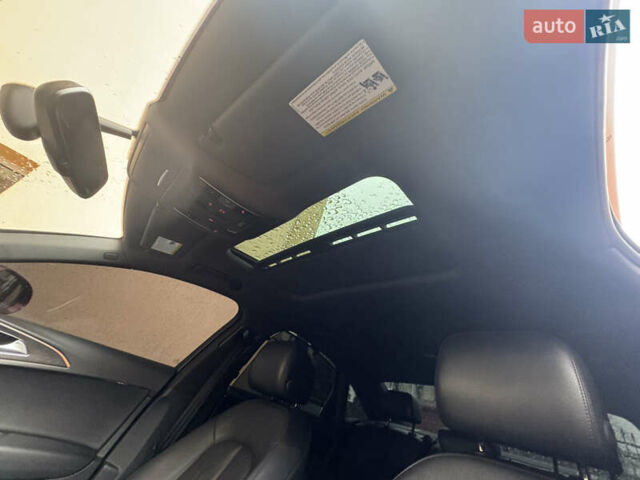 Червоний Ауді А6, об'ємом двигуна 2 л та пробігом 146 тис. км за 19900 $, фото 7 на Automoto.ua