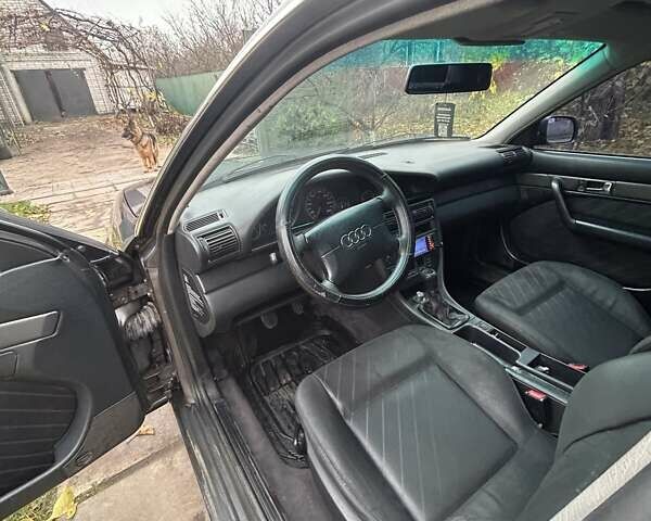 Серый Ауди А6, объемом двигателя 2.6 л и пробегом 318 тыс. км за 3000 $, фото 5 на Automoto.ua