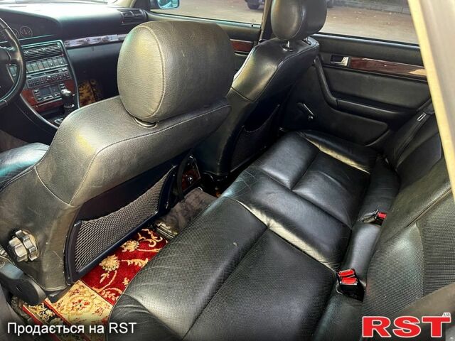 Серый Ауди А6, объемом двигателя 2.6 л и пробегом 312 тыс. км за 3400 $, фото 6 на Automoto.ua