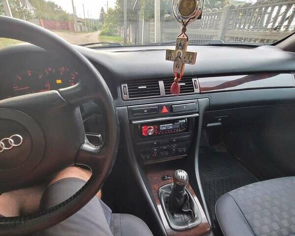 Серый Ауди А6, объемом двигателя 2.5 л и пробегом 313 тыс. км за 4000 $, фото 5 на Automoto.ua