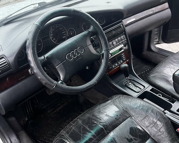 Серый Ауди А6, объемом двигателя 2.6 л и пробегом 369 тыс. км за 4400 $, фото 1 на Automoto.ua