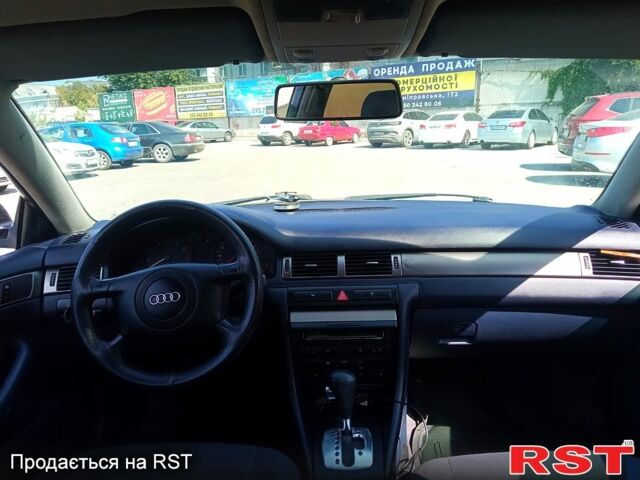 Серый Ауди А6, объемом двигателя 1.8 л и пробегом 265 тыс. км за 4500 $, фото 1 на Automoto.ua