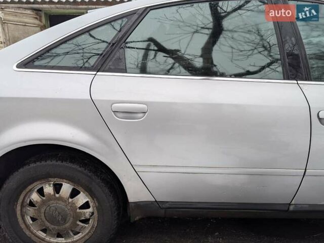 Серый Ауди А6, объемом двигателя 2.4 л и пробегом 317 тыс. км за 3000 $, фото 4 на Automoto.ua