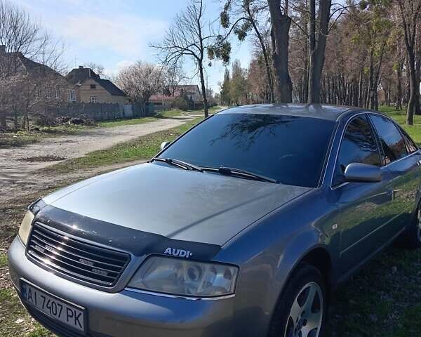 Серый Ауди А6, объемом двигателя 2.39 л и пробегом 300 тыс. км за 5800 $, фото 1 на Automoto.ua