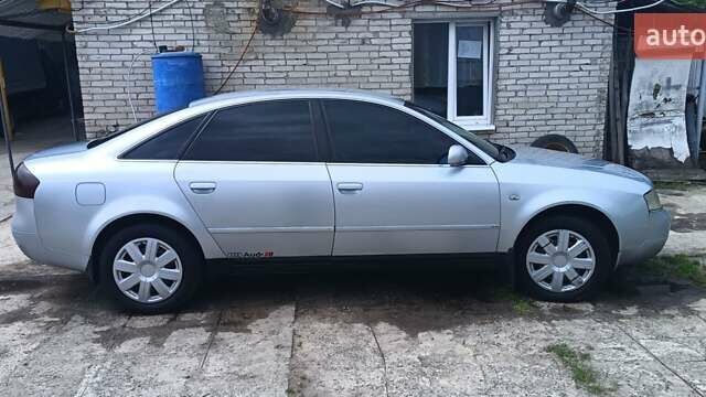 Сірий Ауді А6, об'ємом двигуна 1.8 л та пробігом 303 тис. км за 4400 $, фото 1 на Automoto.ua
