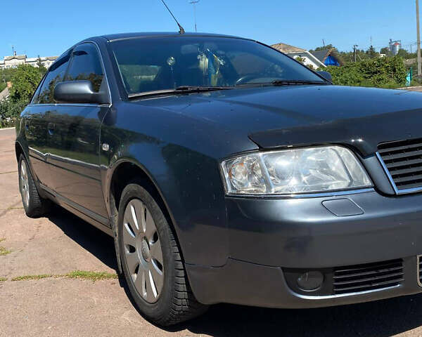 Серый Ауди А6, объемом двигателя 2.5 л и пробегом 338 тыс. км за 5000 $, фото 1 на Automoto.ua