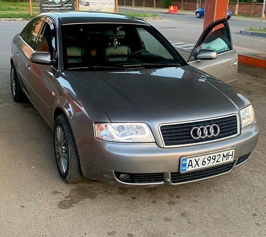 Серый Ауди А6, объемом двигателя 2.4 л и пробегом 289 тыс. км за 5600 $, фото 1 на Automoto.ua