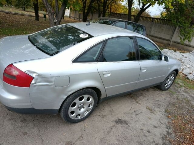 Сірий Ауді А6, об'ємом двигуна 2 л та пробігом 298 тис. км за 2395 $, фото 3 на Automoto.ua