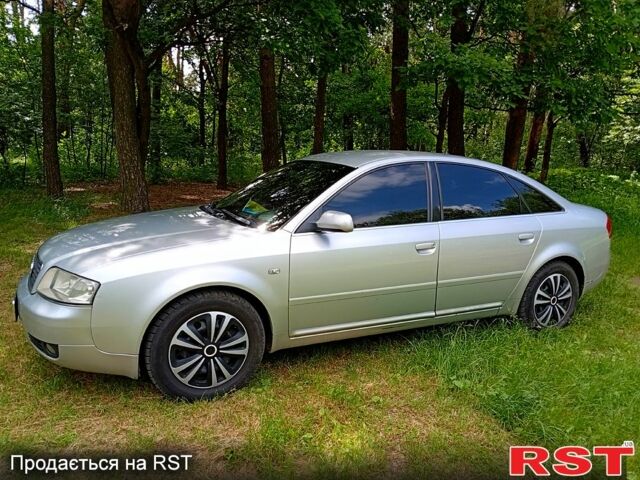 Серый Ауди А6, объемом двигателя 2.5 л и пробегом 344 тыс. км за 4200 $, фото 1 на Automoto.ua