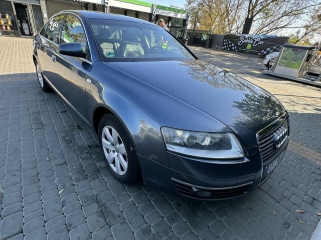 Сірий Ауді А6, об'ємом двигуна 2 л та пробігом 248 тис. км за 7500 $, фото 1 на Automoto.ua