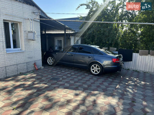 Сірий Ауді А6, об'ємом двигуна 1.97 л та пробігом 395 тис. км за 7900 $, фото 1 на Automoto.ua