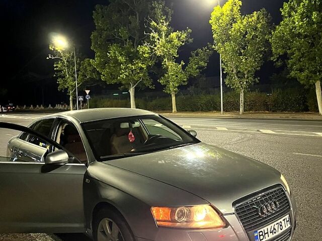 Серый Ауди А6, объемом двигателя 2 л и пробегом 312 тыс. км за 5600 $, фото 1 на Automoto.ua