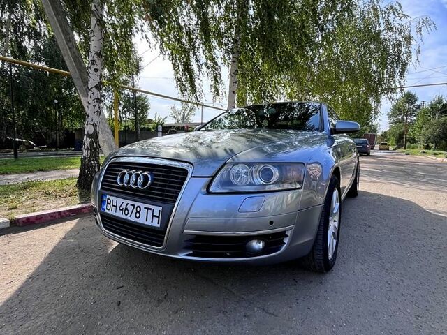 Серый Ауди А6, объемом двигателя 2 л и пробегом 312 тыс. км за 5600 $, фото 4 на Automoto.ua