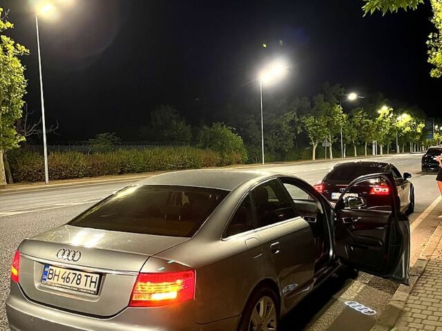 Серый Ауди А6, объемом двигателя 2 л и пробегом 312 тыс. км за 5600 $, фото 2 на Automoto.ua