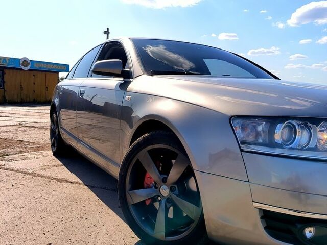Серый Ауди А6, объемом двигателя 3 л и пробегом 300 тыс. км за 8500 $, фото 1 на Automoto.ua