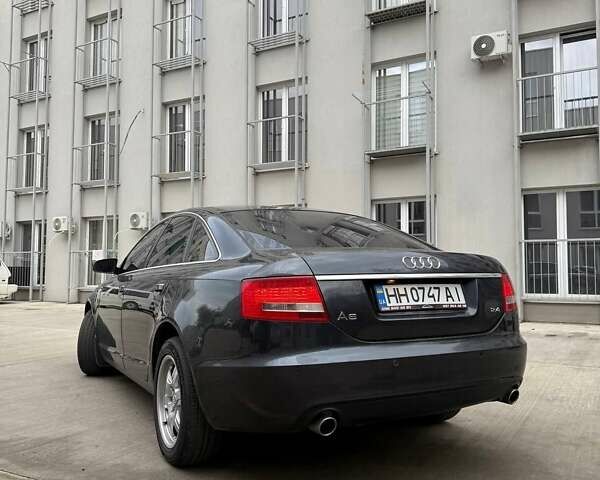Сірий Ауді А6, об'ємом двигуна 2.39 л та пробігом 365 тис. км за 6600 $, фото 1 на Automoto.ua