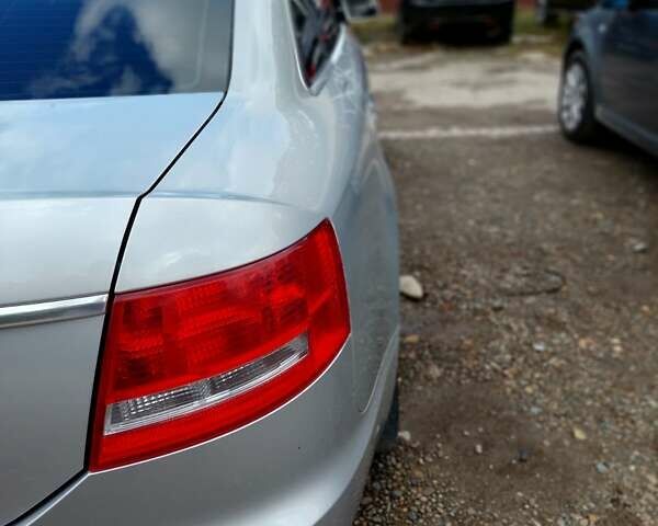 Сірий Ауді А6, об'ємом двигуна 2 л та пробігом 256 тис. км за 7000 $, фото 1 на Automoto.ua