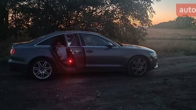 Серый Ауди А6, объемом двигателя 3 л и пробегом 200 тыс. км за 12500 $, фото 2 на Automoto.ua