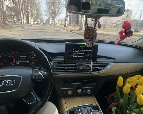 Серый Ауди А6, объемом двигателя 1.98 л и пробегом 267 тыс. км за 14000 $, фото 6 на Automoto.ua