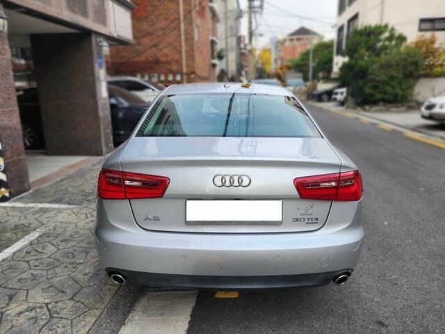 Сірий Ауді А6, об'ємом двигуна 3 л та пробігом 105 тис. км за 5199 $, фото 1 на Automoto.ua