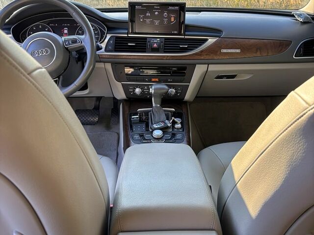 Серый Ауди А6, объемом двигателя 2 л и пробегом 145 тыс. км за 14900 $, фото 3 на Automoto.ua