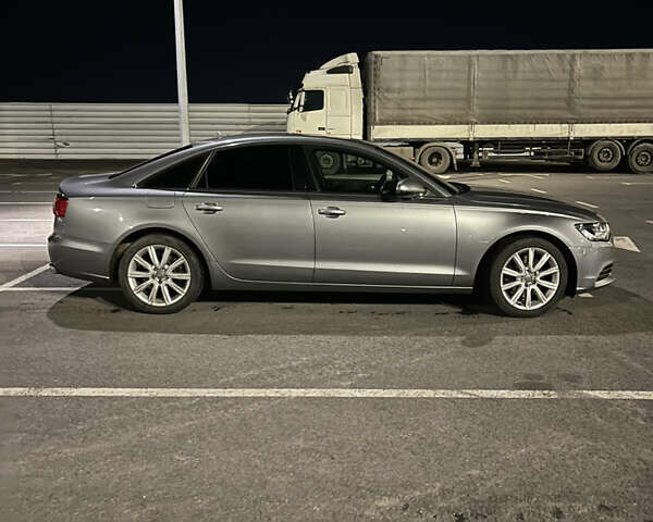 Сірий Ауді А6, об'ємом двигуна 1.98 л та пробігом 180 тис. км за 13599 $, фото 2 на Automoto.ua