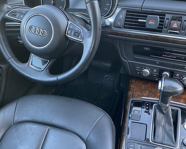 Серый Ауди А6, объемом двигателя 1.98 л и пробегом 247 тыс. км за 14250 $, фото 1 на Automoto.ua