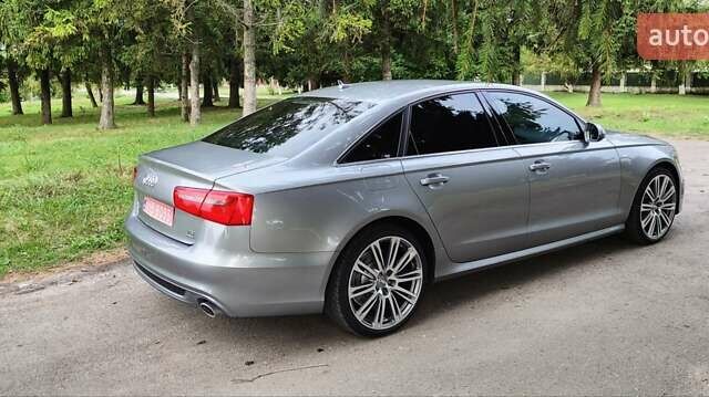Сірий Ауді А6, об'ємом двигуна 3 л та пробігом 248 тис. км за 17999 $, фото 1 на Automoto.ua