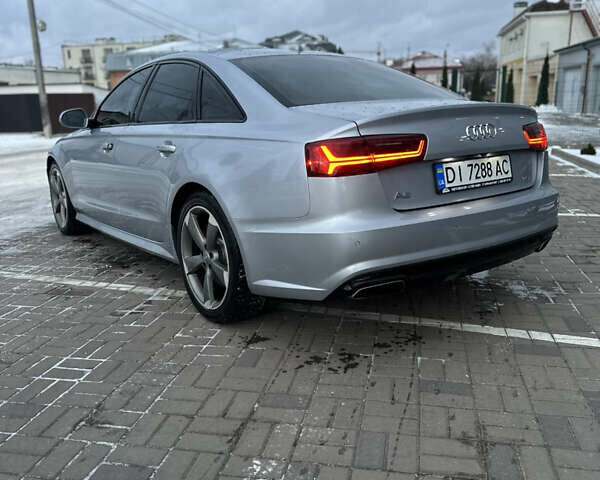 Сірий Ауді А6, об'ємом двигуна 1.98 л та пробігом 174 тис. км за 13500 $, фото 1 на Automoto.ua