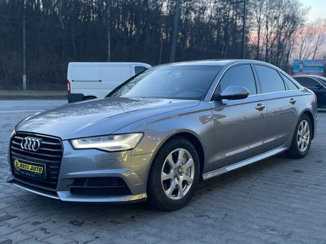 Серый Ауди А6, объемом двигателя 2 л и пробегом 129 тыс. км за 18500 $, фото 2 на Automoto.ua