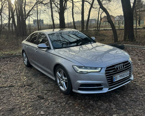 Сірий Ауді А6, об'ємом двигуна 1.98 л та пробігом 124 тис. км за 16500 $, фото 1 на Automoto.ua