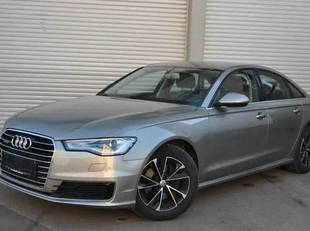 Серый Ауди А6, объемом двигателя 2 л и пробегом 168 тыс. км за 13000 $, фото 1 на Automoto.ua