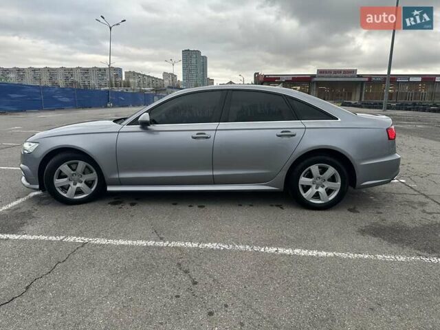 Сірий Ауді А6, об'ємом двигуна 1.98 л та пробігом 64 тис. км за 25100 $, фото 1 на Automoto.ua