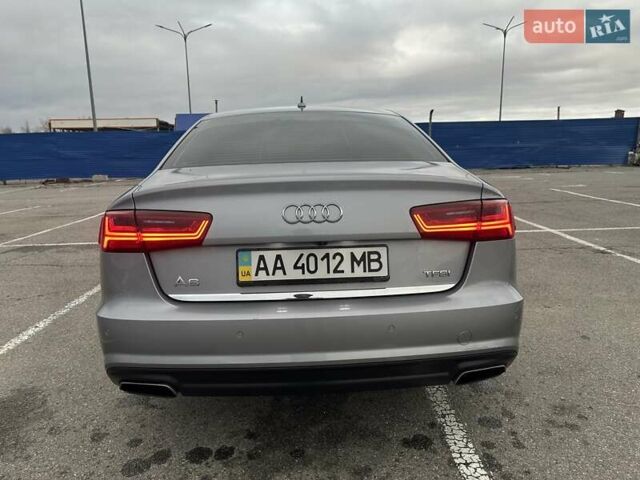 Сірий Ауді А6, об'ємом двигуна 1.98 л та пробігом 64 тис. км за 25100 $, фото 2 на Automoto.ua