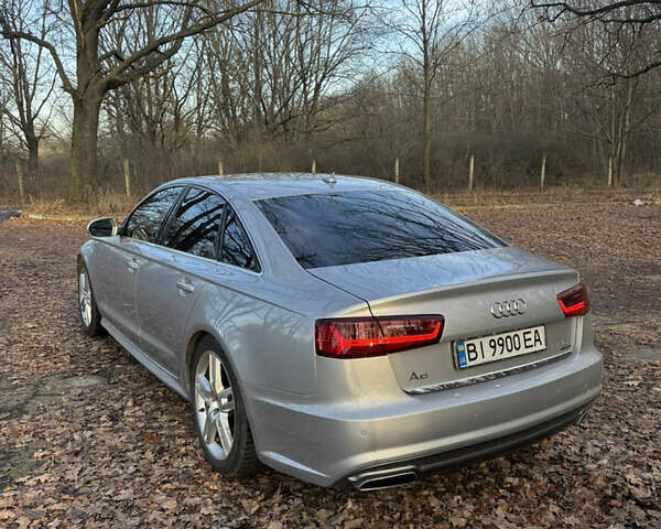 Сірий Ауді А6, об'ємом двигуна 1.98 л та пробігом 124 тис. км за 16500 $, фото 4 на Automoto.ua
